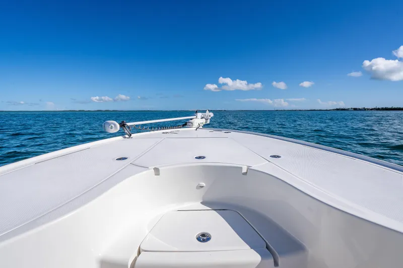 Slide: The Image of 2017 SeaVee 270Z boat on open water under clear blue sky. - 17