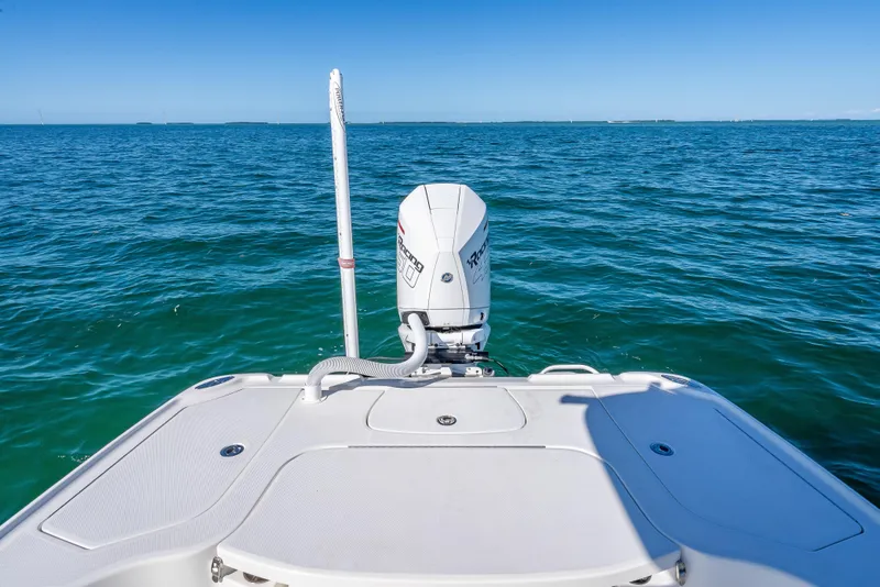 Slide: The Image of 2017 SeaVee 270Z boat on open water with outboard motor. - 21