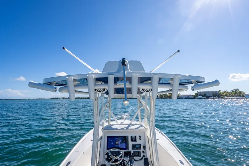Slide: The Image of 2017 SeaVee 270Z boat on water, clear sky, sunny day, view from helm. - 9
