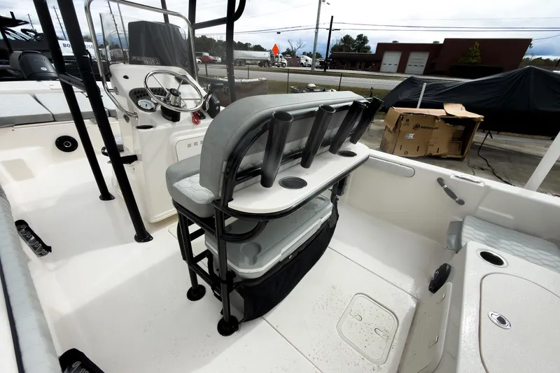 Slide: The Image of 2026 Carolina Skiff 21 LS boat interior with steering console and seating. - 10