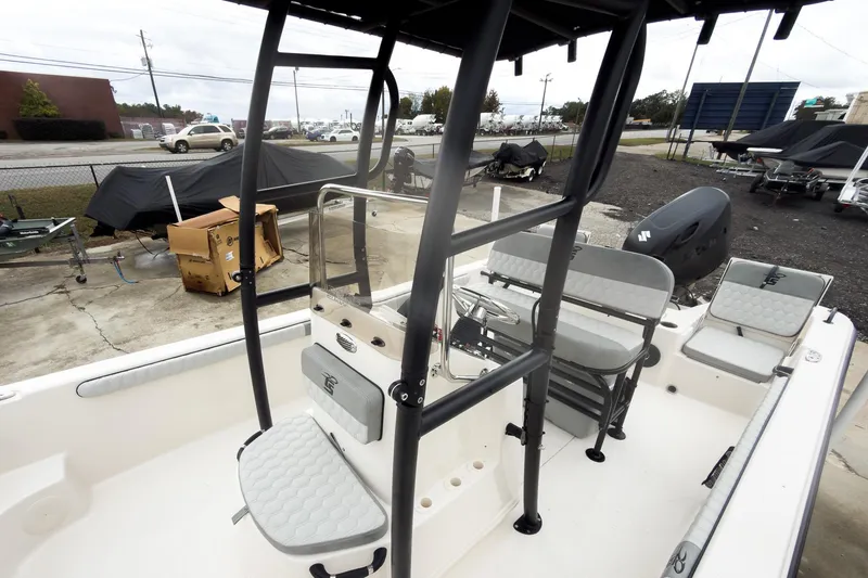 Slide: The Image of 2026 Carolina Skiff 21 LS boat interior with seating and steering console. - 20