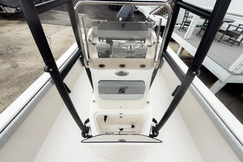 Slide: The Image of 2026 Carolina Skiff 21 LS boat console with seating and steering wheel. - 22