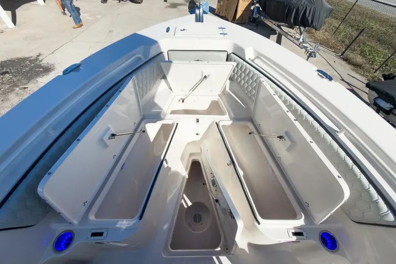 Slide: The Image of 2026 Sea Chaser 24 HFC DE boat interior with open storage compartments. - 19