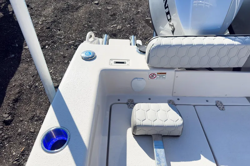 Slide: The Image of 2026 Sea Chaser 24 HFC DE boat interior with seating and cup holder. - 28