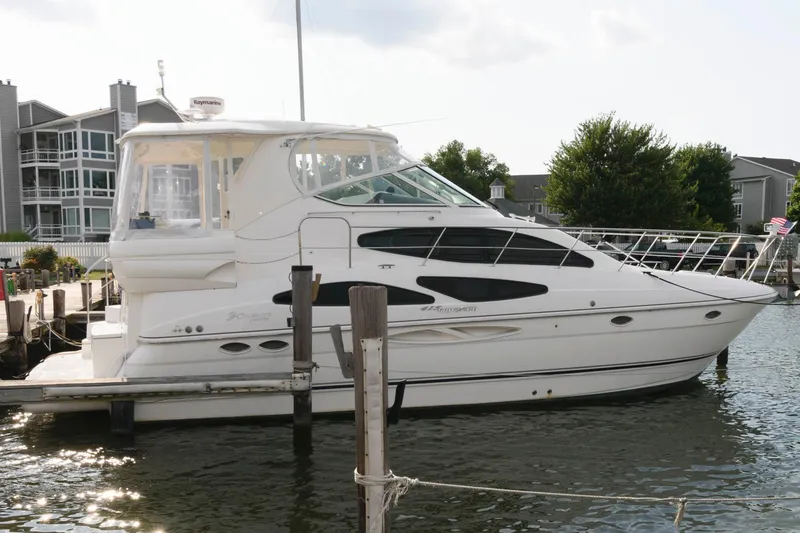 The Image of 2007 Cruisers Yachts 415 Express Motoryacht docked at marina. - 0