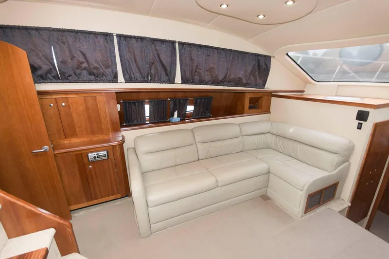 Slide: The Image of Interior of 2007 Cruisers Yachts 415 Express Motoryacht with leather sofa. - 13