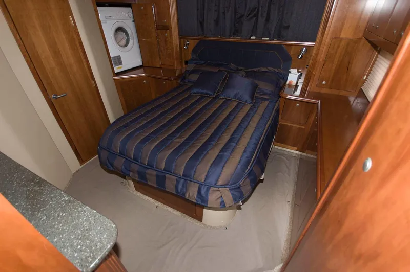 Slide: The Image of Luxurious bedroom in a 2007 Cruisers Yachts 415 Express Motoryacht. - 18