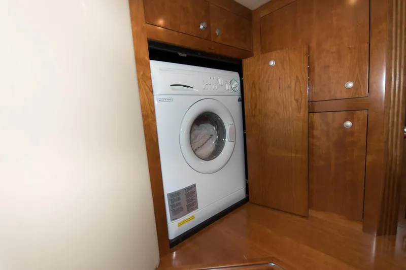 Slide: The Image of Washing machine in 2007 Cruisers Yachts 415 Express Motoryacht. - 19