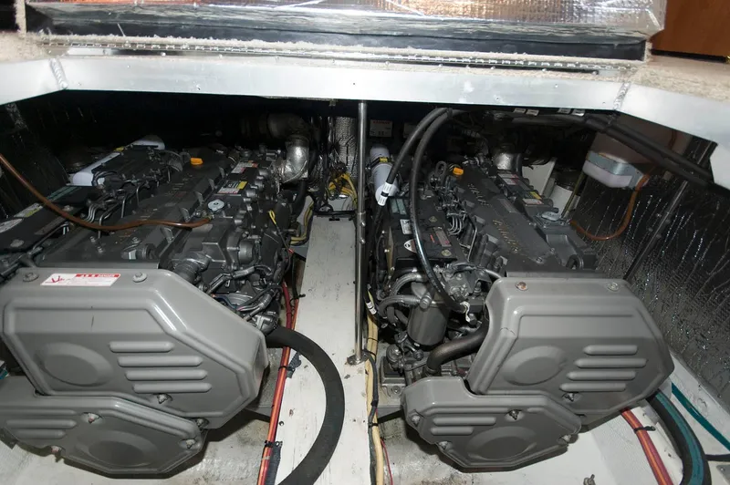 Slide: The Image of 2007 Cruisers Yachts 415 engine room with dual engines. - 24
