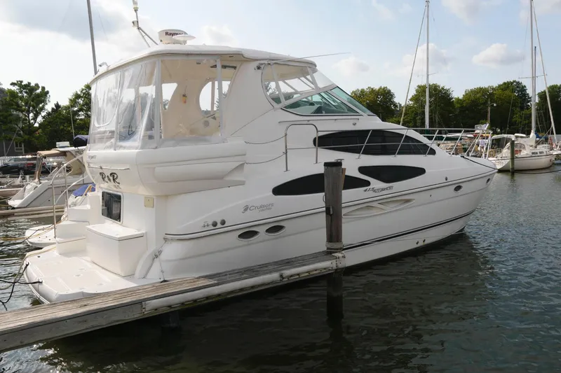 Slide: The Image of 2007 Cruisers Yachts 415 Express Motoryacht docked in harbor. - 1