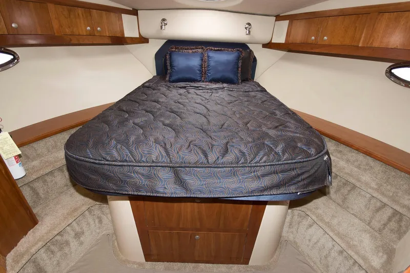 Slide: The Image of Luxurious bedroom in a 2007 Cruisers Yachts 415 Express Motoryacht. - 21