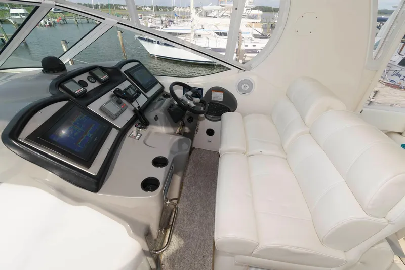 Slide: The Image of Interior of a 2007 Cruisers Yachts 415 Express Motoryacht helm station. - 4