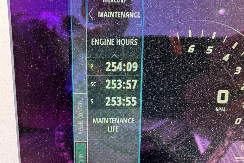 Slide: The Image of Display screen showing engine hours for 2019 Intrepid 407 Cuddy boat. - 17