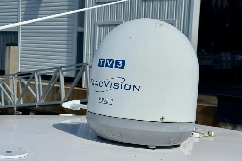 Slide: The Image of KVH TracVision TV3 satellite dome on 2019 Intrepid 407 Cuddy boat. - 19