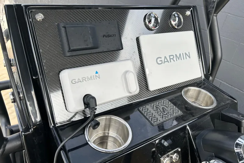 Slide: The Image of Control panel of 2024 Highfield Sport 560 with Garmin navigation system. - 13