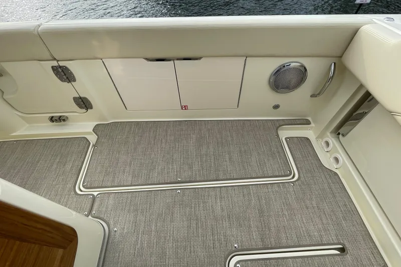 Slide: The Image of 2026 Chris-Craft 310 Catalina boat interior with sleek flooring and modern design elements. - 26