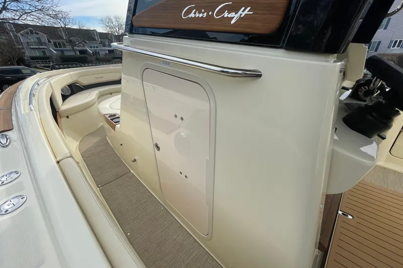 Slide: The Image of 2026 Chris-Craft 310 Catalina boat interior with seating and sleek design. - 63