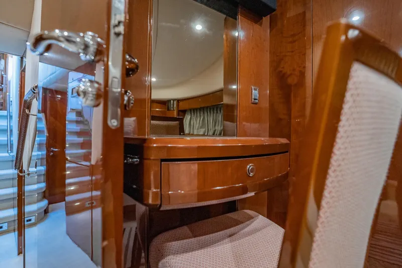 Slide: The Image of Luxurious interior of 2004 Viking Princess Flybridge yacht with polished wood and elegant furnishings. - 36