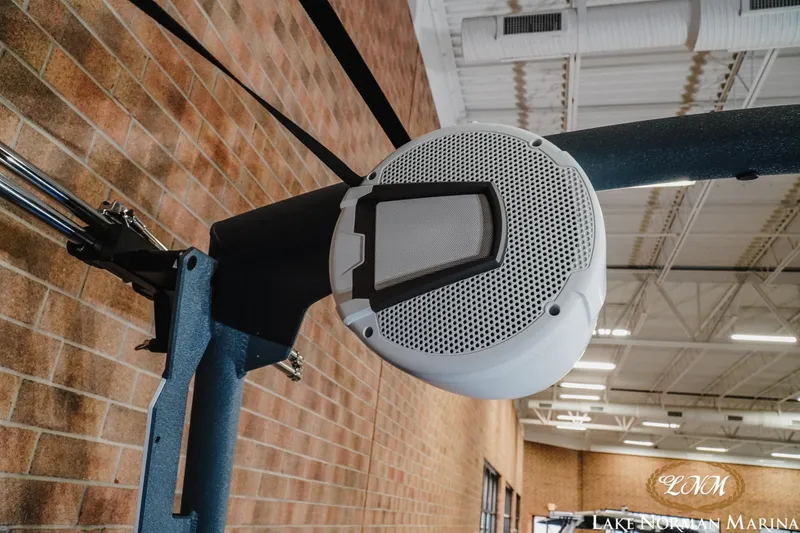 Slide: The Image of 2026 Axis T235 boat speaker mounted on a metal frame indoors. - 23