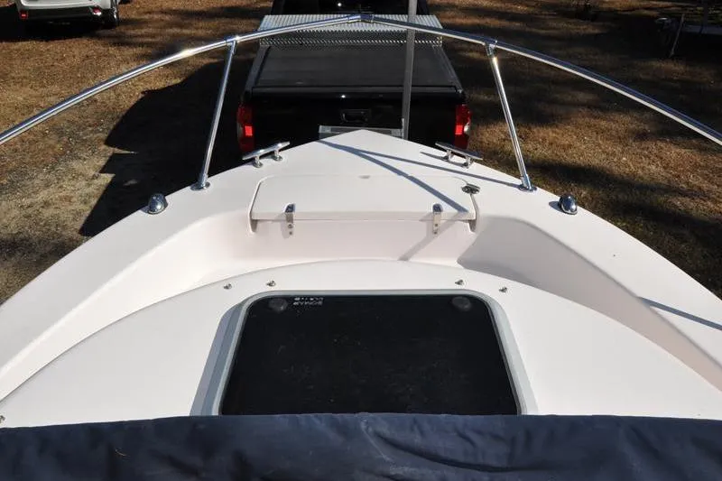 Slide: The Image of 2007 Grady-White Seafarer 226 boat bow with railing and hatch, parked on trailer. - 34