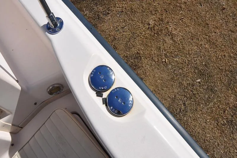 Slide: The Image of 2007 Grady-White Seafarer 226 boat deck with blue fittings and seating. - 36