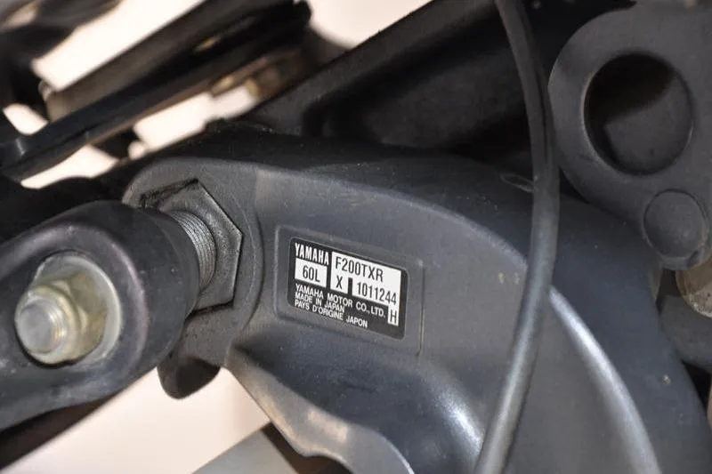 Slide: The Image of Close-up of Yamaha F200TXR engine part on 2007 Grady-White Seafarer 226 boat. - 39