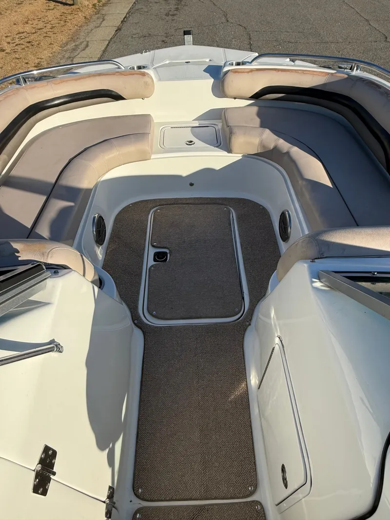 Slide: The Image of Interior view of a 2013 Hurricane 217 SunDeck OB boat. - 5