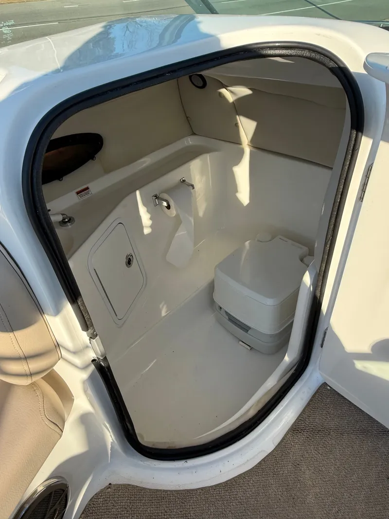 Slide: The Image of Interior of 2013 Hurricane 217 SunDeck OB with toilet. - 6