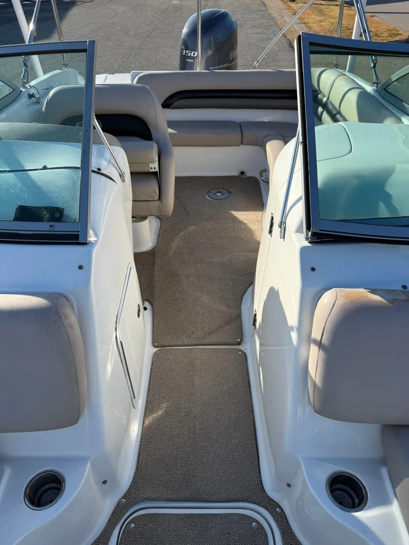 Slide: The Image of Interior view of a 2013 Hurricane 217 SunDeck OB boat. - 8