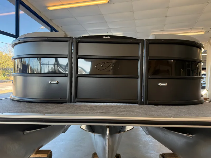 Slide: The Image of 2026 Bentley Pontoons 223 Bolt in a showroom. - 3