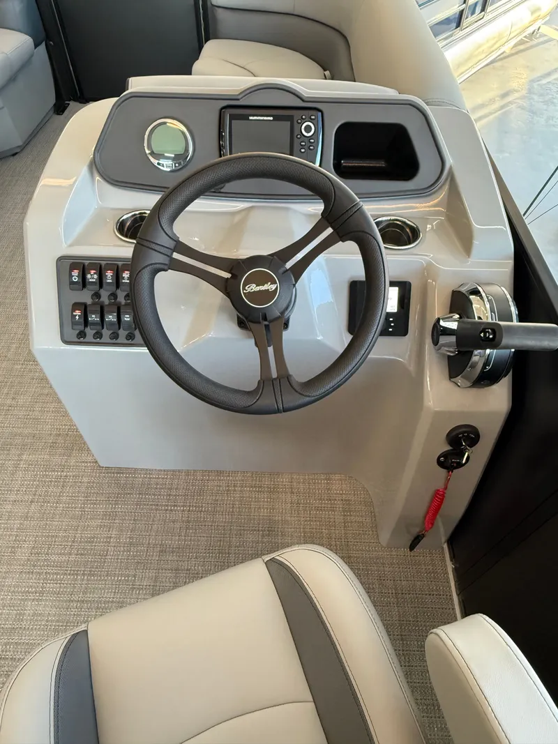 Slide: The Image of Interior view of Bentley Pontoons 223 Bolt 2026 helm station. - 6