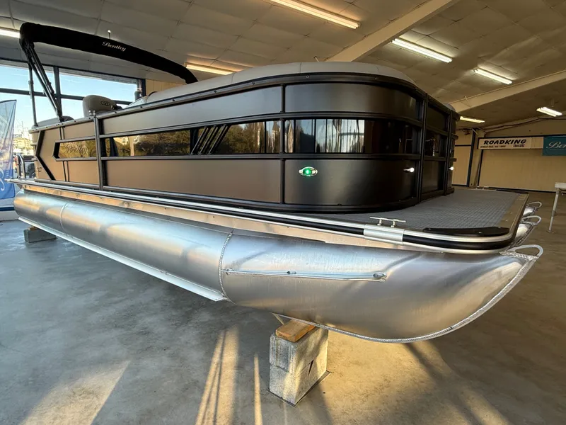 Slide: The Image of 2026 Bentley Pontoons 223 Bolt in showroom. - 7