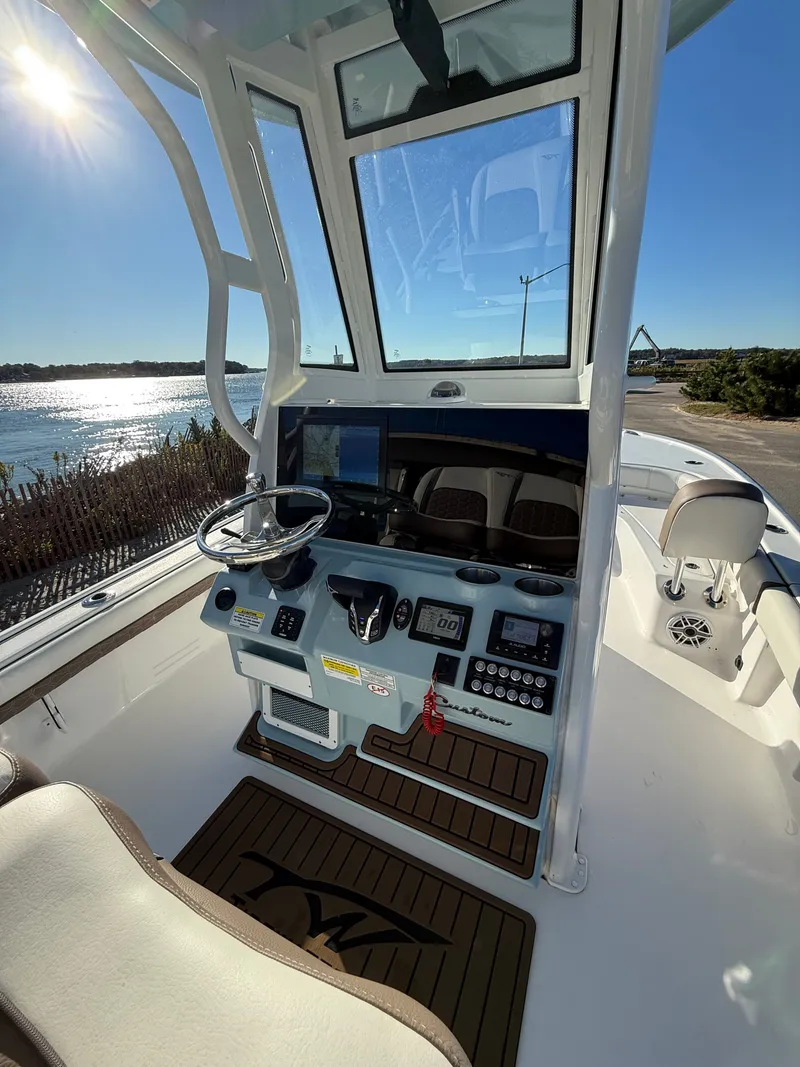 Slide: The Image of Interior view of 2024 Tidewater 2500 Carolina Bay Custom boat. - 12