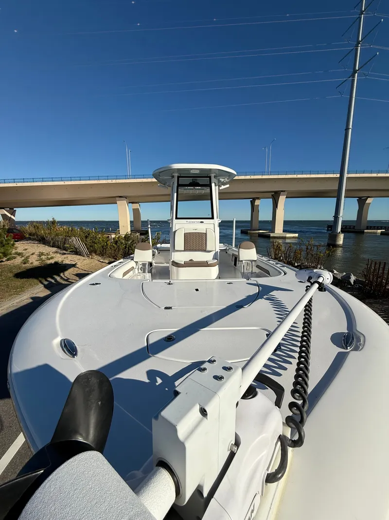 Slide: The Image of 2024 Tidewater 2500 Carolina Bay Custom boat by the water. - 6
