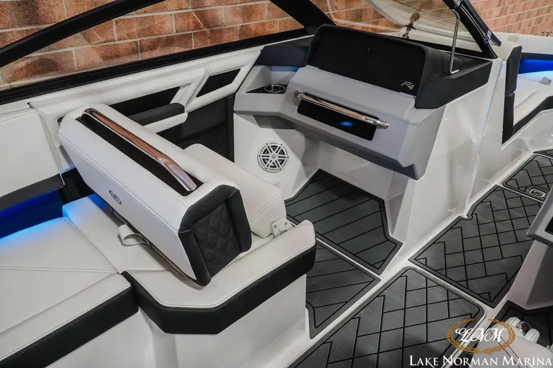 Slide: The Image of 2026 Cobalt R4 boat interior with modern seating and sleek dashboard design. - 12