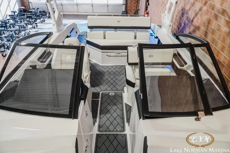 Slide: The Image of 2026 Cobalt R4 boat interior with sleek seating and modern design at Lake Norman Marina. - 15