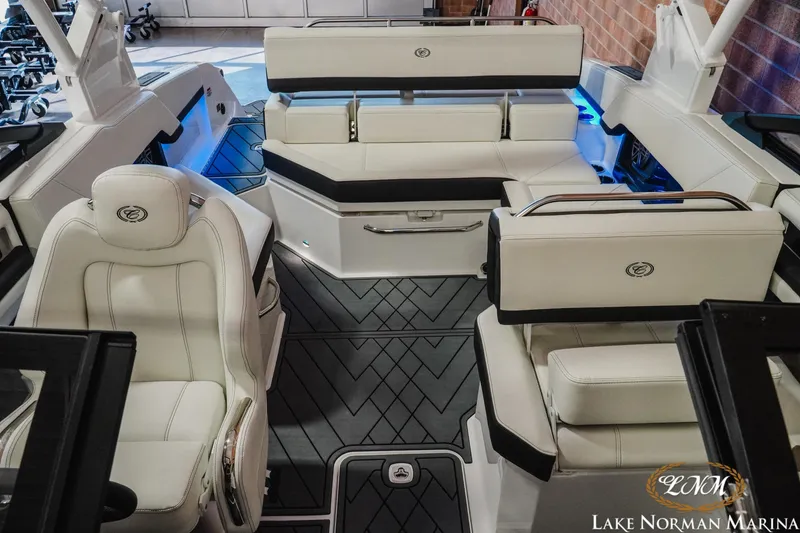 Slide: The Image of Luxurious interior of 2026 Cobalt R4 boat with white leather seating at Lake Norman Marina. - 16