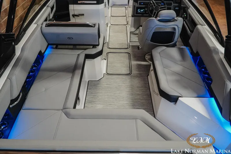 Slide: The Image of Luxurious interior of 2026 Cobalt R6 boat with modern seating and ambient lighting. - 13