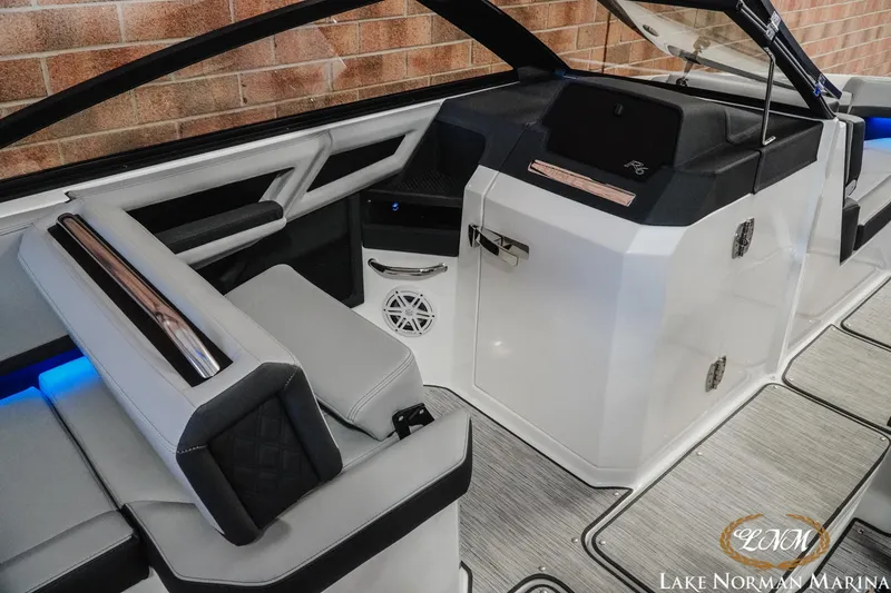 Slide: The Image of 2026 Cobalt R6 boat interior with modern seating and sleek design at Lake Norman Marina. - 19