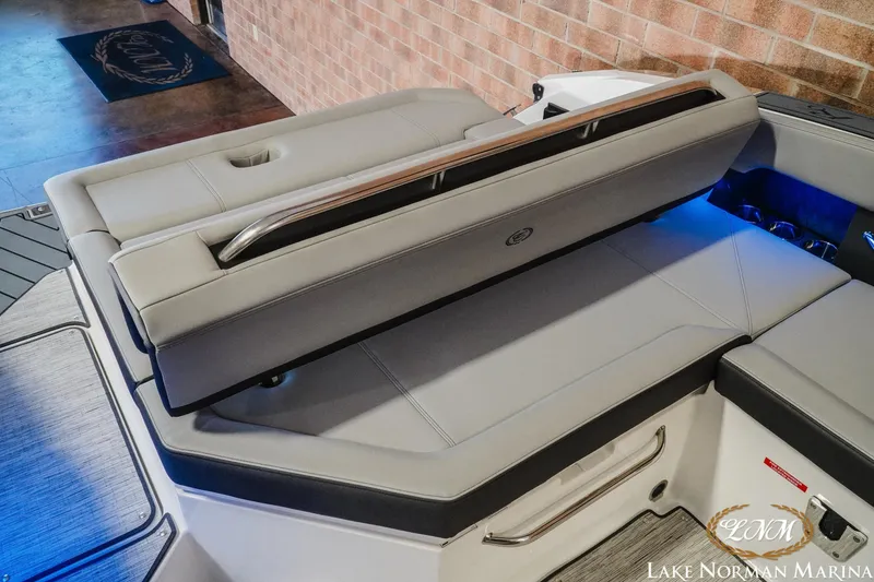 Slide: The Image of 2026 Cobalt R6 boat interior with adjustable seating and ambient lighting at Lake Norman Marina. - 3