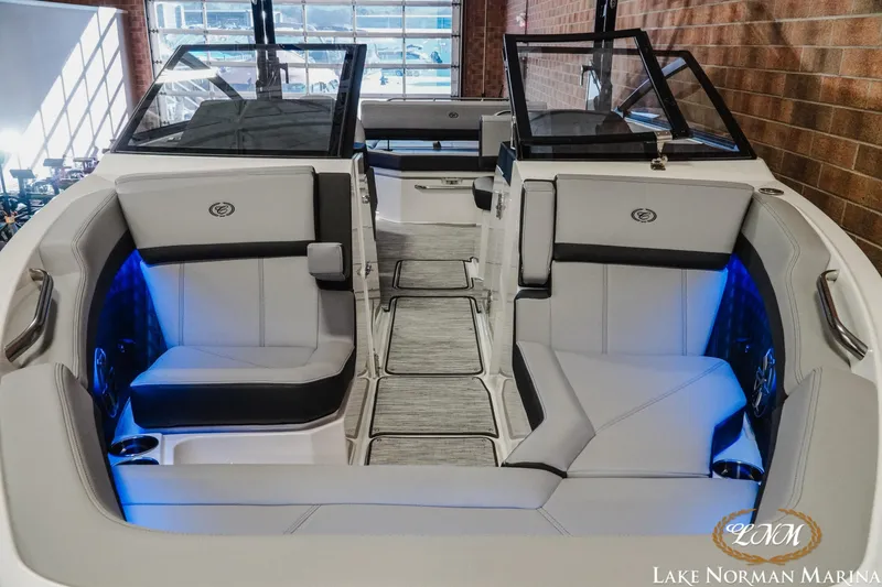 Slide: The Image of 2026 Cobalt R6 boat interior with luxurious seating and ambient blue lighting. - 8