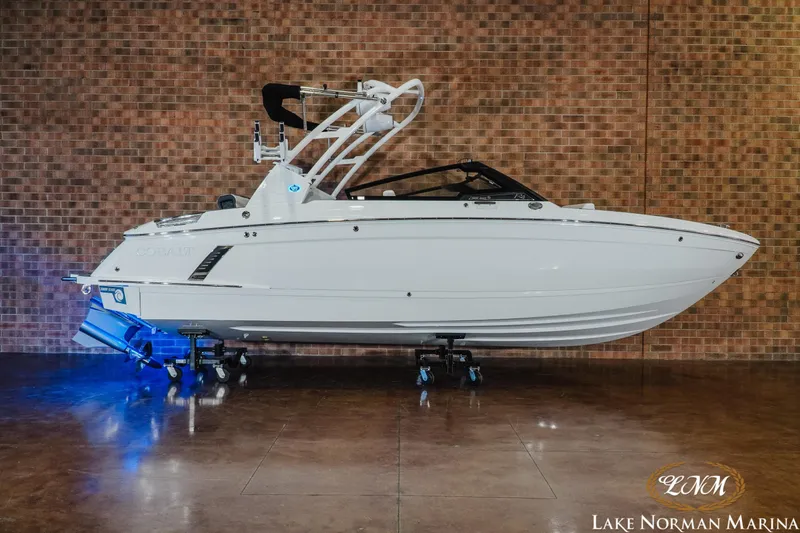 The Image of 2026 Cobalt R4 Surf boat displayed indoors at Lake Norman Marina. - 0
