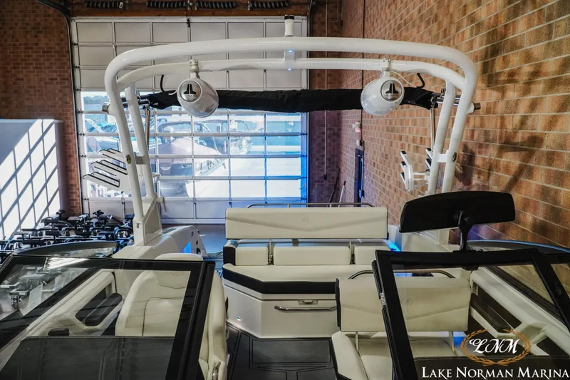 Slide: The Image of 2026 Cobalt R4 Surf boat in showroom at Lake Norman Marina. - 23