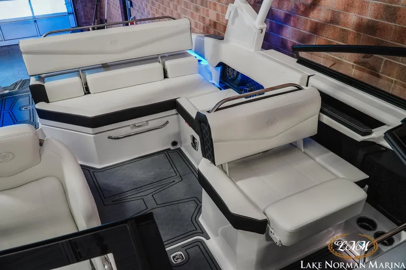 Slide: The Image of 2026 Cobalt R4 Surf boat interior with white seating and modern design. - 3