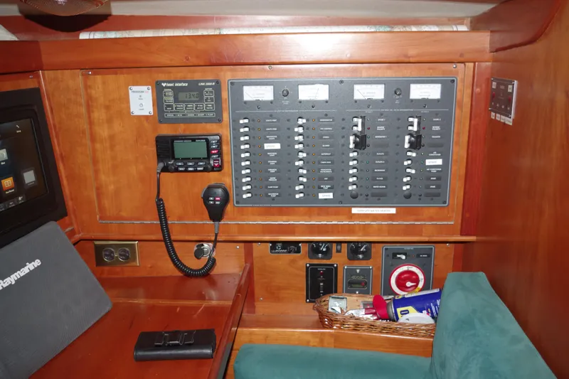 Slide: The Image of Control panel of a 2001 Tartan 4100 yacht with navigation and communication equipment. - 19