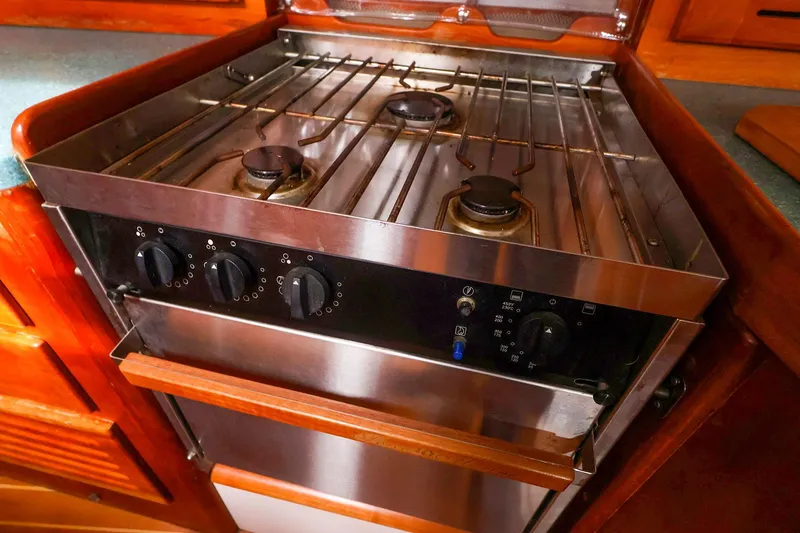 Slide: The Image of Stainless steel stove in a 2001 Tartan 4100 yacht kitchen. - 40
