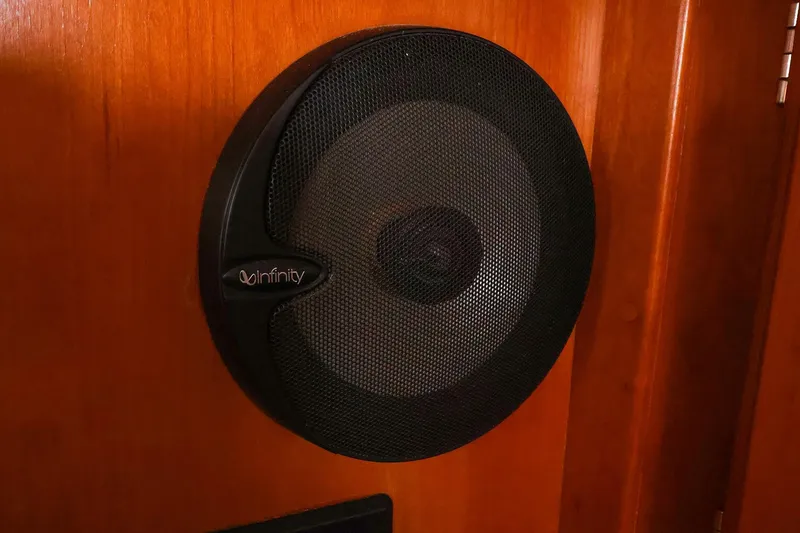 Slide: The Image of Speaker mounted on wooden panel inside a 2001 Tartan 4100 yacht. - 44