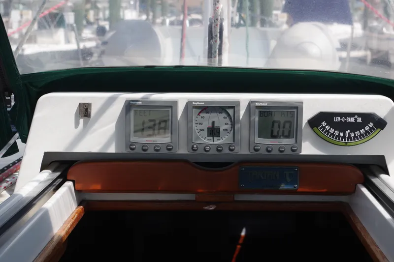 Slide: The Image of Control panel of a 2001 Tartan 4100 sailboat with navigation instruments. - 8