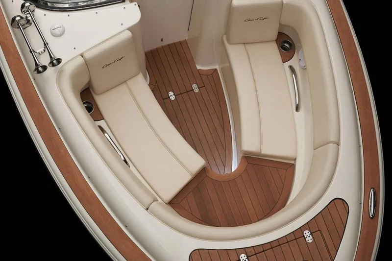 Slide: The Image of 2026 Chris-Craft Launch 27 boat interior with elegant seating and wooden flooring. - 11