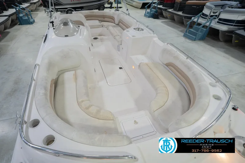 Slide: The Image of 2002 Hurricane SunDeck Sport 232 OB boat interior with spacious seating in showroom. - 13